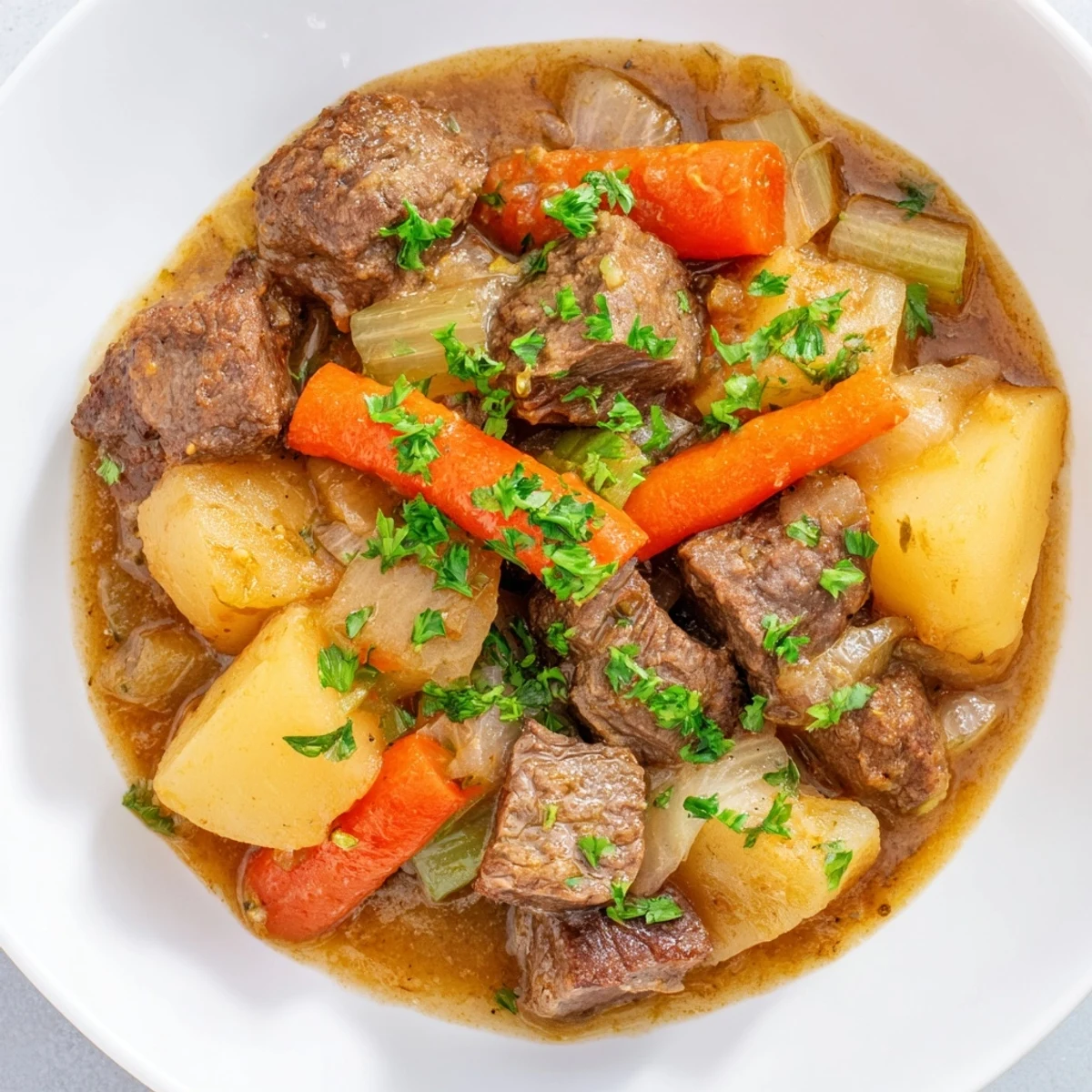 Hearty Irish Beef Stew with chunks of beef, carrots, and potatoes, a classic Irish dish.
