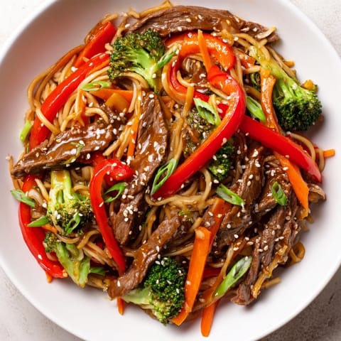 Tender beef, colorful veggies, and lo mein noodles shine in this comforting Easy Beef Stir-Fry recipe.