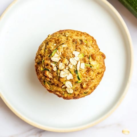 A close-up of warm, moist freezer-friendly breakfast muffins, ready to grab and enjoy with coffee.