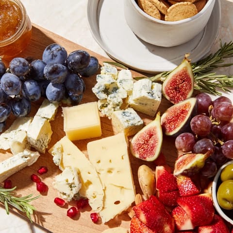 The "Final Curtain" recipe features a dramatic grazing board with flowing cheese and fresh produce ready.